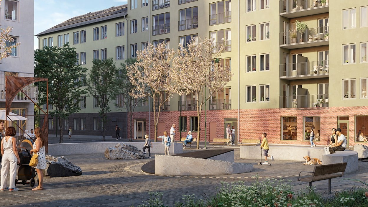 Visionsbild av torget Bryggan över hus, och människor som rör sig på ett torg