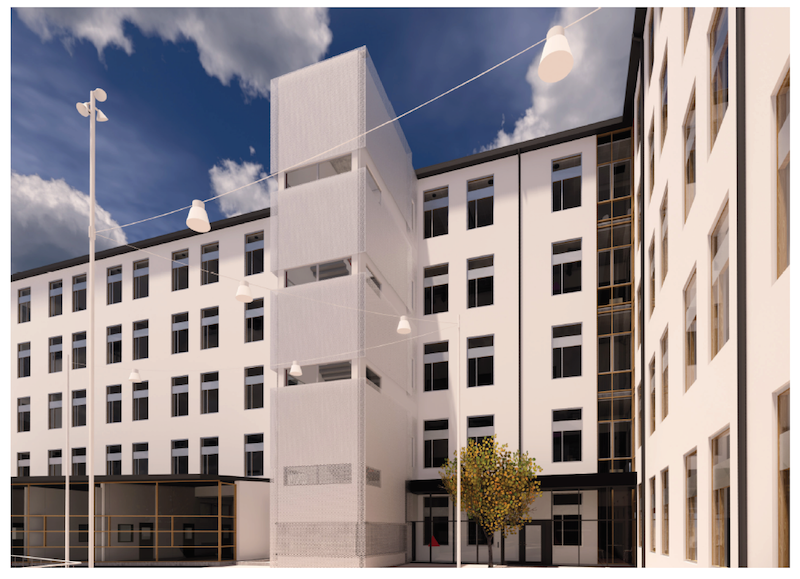 Vit fasad på Söderbymalmsskolans nya lokaler