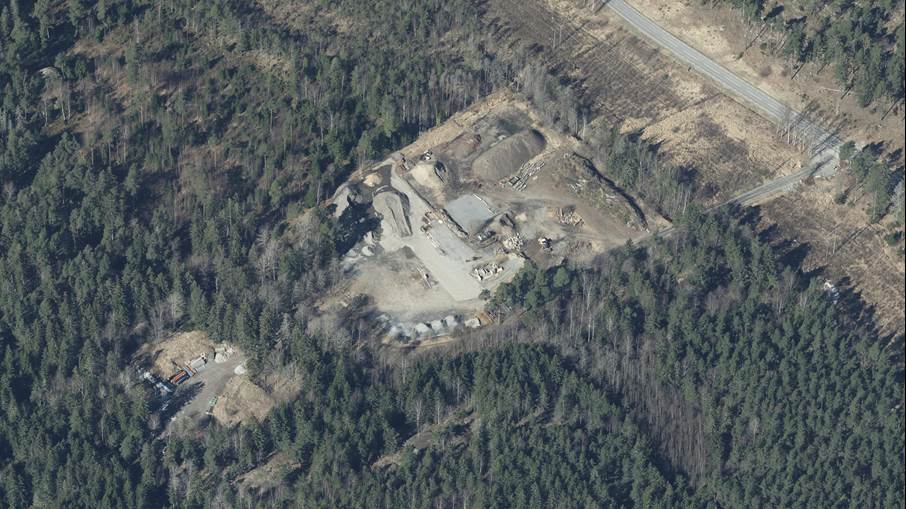 Flygbild över Skäggsmo mellanlagringsanläggning söder om Brandbergen Flygbild över Skäggsmo mellanlagringsanläggning söder om Brandbergen