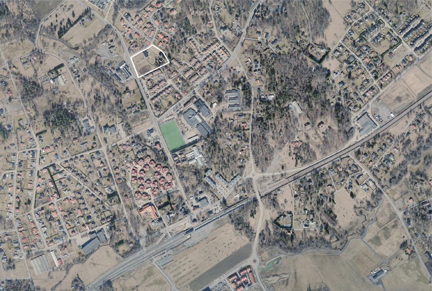 Flygfoto över platsen med markering som visar de berörda fastigheterna.